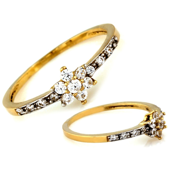 złoty pierścionek z kamieniami