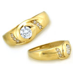 Złoty pierścionek z kamieniami