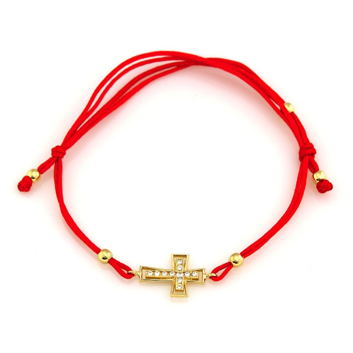bransoletka sznurkowa ze złotym krzyżykiem 585