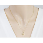 Zawieszka złota okrągła z kluczem wiolinowym i nutkami