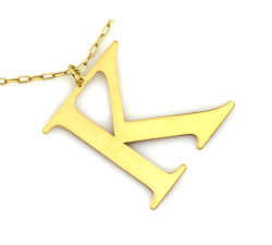 Srebrny naszyjnik z pozłacaną literą K gładki styl celebrytka