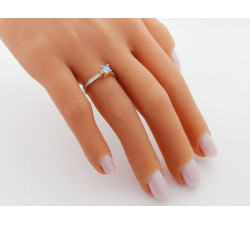 Pierścionek ze złota 585 niebieskie oczko z cyrkoniami