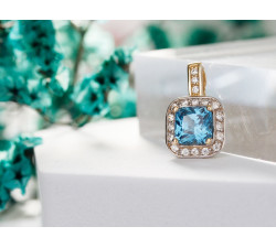Złota zawieszka 585 elegancka z kwadratowym akwamarynem  klasyczny design idealna na prezent