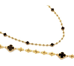 Złoty naszyjnik z kulkami z czarnymi kwiatkami
