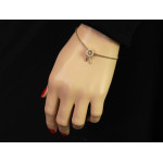 Złota przywieszka z piórkiem i cyrkoniami