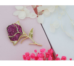 Złota broszka z cyrkoniami dla kobiety