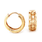 Złote kolczyki w kształcie kół z ażurowym wzorem – subtelność i elegancja