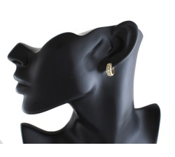 Złote kolczyki w kształcie kół z ażurowym wzorem – subtelność i elegancja