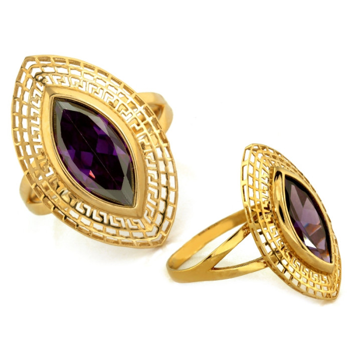 Duży złoty pierścień z fioletowym kamieniem