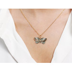 Złota przywieszka ze zwierzęcym motywem