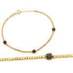 Złota bransoletka z błyszczących kulek