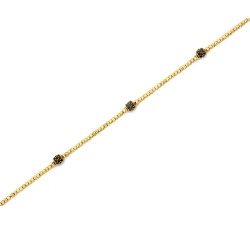 Złota bransoletka z błyszczących kulek