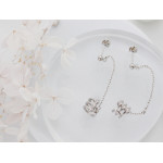 Srebrne kolczyki wiszące na łańcuszku