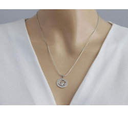 Srebrny medalik z motywem zodiaku