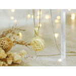 Medalik srebrny pozłacany okrągły z Matką Bożą