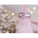 Pierścionek srebrny przeplatany szeroki z cyrkoniami