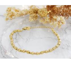 Pozłacana bransoletka stalowa z kuleczkami