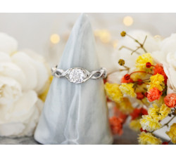 Pierścionek srebrny z cyrkoniami przeplatana szyna