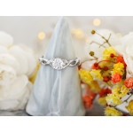 Pierścionek srebrny z cyrkoniami przeplatana szyna