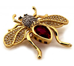 Złota broszka pszczoła z czerwonym kamieniem