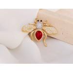 Złota broszka pszczoła z czerwonym kamieniem